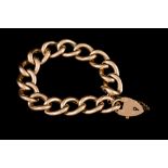 AN ANTIQUE 9CT GOLD CURB LINK BRACELET, hollow links,