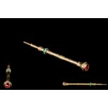AN ANTIQUE GOLD PENCIL, set with turquoise,