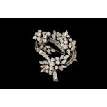 A DIAMOND FLORAL SPRAY BROOCH,