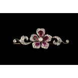 A LATE VICTORIAN RUBY AND DIAMOND FLORAL BAR BROOCH, with rubies of approx. 2.