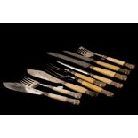 A VICTORIAN SEVEN PIECE CARVING SET, cased; together with a pair of Victorian servers,