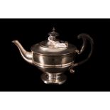 AN EDWARDIAN SILVER BACHELORS TEAPOT, raised on a central pedestal, by Walker & Hall,