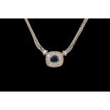 A SAPPHIRE AND DIAMOND PENDANT, with sapphire of approx. 1.50ct, surrounded by diamonds of approx.