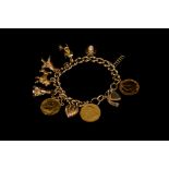 A GOLD CHARM BRACELET,