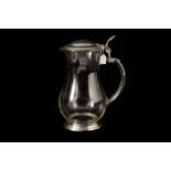 A PEWTER MOUNTED GLASS WINE JUG,