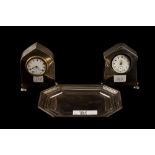 TWO EARLY 20TH CENTURY SILVER CASED CLOCKS; together with a George V rectangular silver card tray,