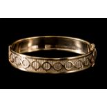 A 9CT GOLD BANGLE