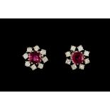 A PAIR OF RUBY AND DIAMOND CLUSTER EARRINGS, with round cut rubies of 1.