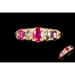 A VICTORIAN RUBY AND DIAMOND CARVED RING, with ruby of approx. 0.80ct, diamonds of approx. 0.