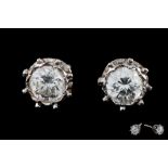 A PAIR OF DIAMOND SOLITAIRE EARRINGS, of approx. 1.