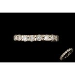 A DIAMOND ETERNITY RING,