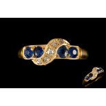 A SAPPHIRE AND DIAMOND DRESS RING, with sapphires of approx. 0.40ct and diamonds of approx. 0.