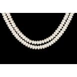 A TWO STRANDED BUTTON PEARL CHOKER NECKLACE,