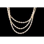 A THREE ROW CULTURED PEARL NECKLACE