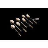 FOUR AMERICAN STERLING SILVER TEASPOONS; together with three silver apostle spoons,