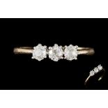 AN ANTIQUE DIAMOND THREE STONE DRESS RING,