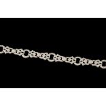 A DIAMOND COCKTAIL BRACELET CIRCA 1920'S, mounted in platinum,