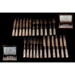 TWO SETS OF SIX TEA KNIVES AND FORKS, with mother of pearl handles,