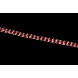 A RUBY AND DIAMOND BRACELET, set with rubies of approx. 20.50ct total and diamonds of approx. 0.