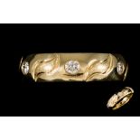 A 14CT YELLOW GOLD DIAMOND BAND RING, heavy court band set with diamonds of approx. 0.