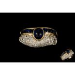 A SAPPHIRE AND DIAMOND DRESS RING,