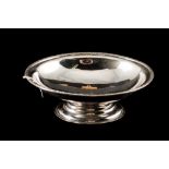 A MODERN OVAL SHAPED SILVER DISH WITH APPLIED BORDER raised on a stepped base, Sheffield,