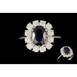 A SAPPHIRE RING with a sapphire of approx 2ct and approx 1.50ct G/VS of brilliant cut diamonds.