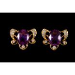 A PAIR OF PURPLE RUBY AND DIAMOND CLUSTER EARRINGS, mounted in 18ct gold,