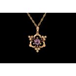 AN ANTIQUE AMETHYST AND SPLIT PEARL PENDANT, mounted in 9ct gold,