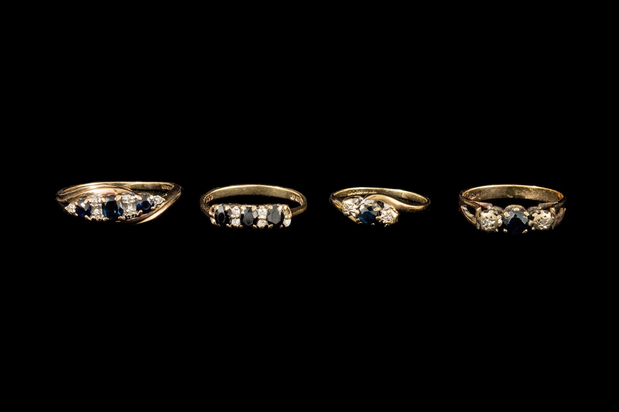 FOUR SAPPHIRE AND GEM SET DRESS RINGS,