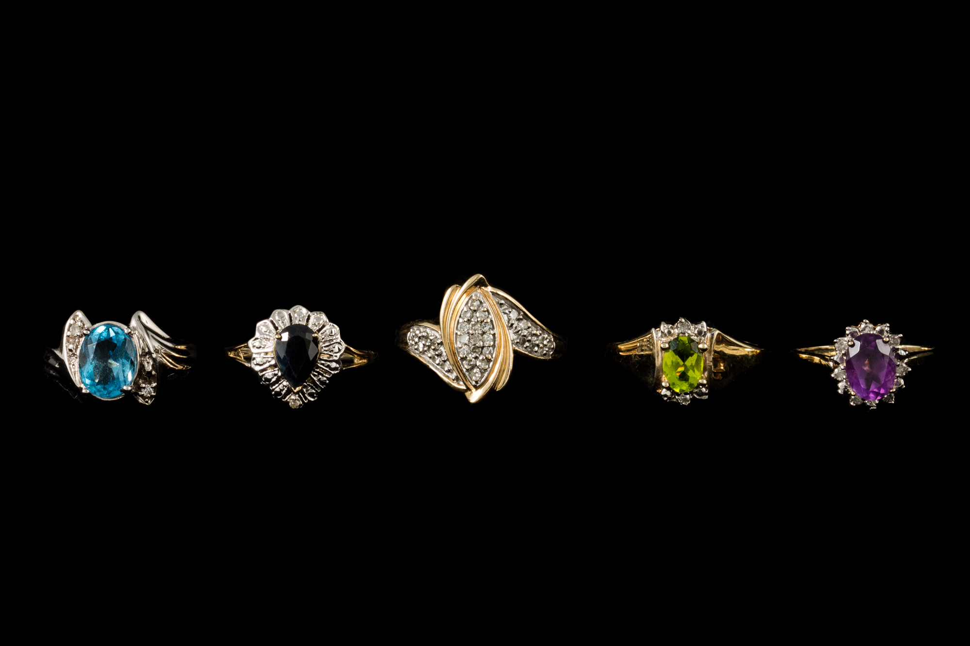 FIVE GEM SET DRESS RINGS,