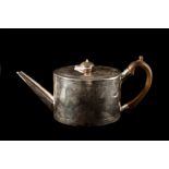 A GEORGE III IRISH SILVER TEA POT, chased and engraved bright cut decoration, ca 1800,