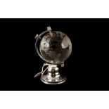 AN EDWARDIAN SILVER FRAMED GLASS GLOBE Birmingham 1907, ca 4" high.