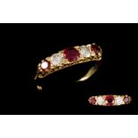 A RUBY AND DIAMOND CARVED DRESS RING, mounted in 18ct gold. Estimated; weight of ruby; 0.