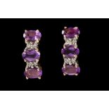 A PAIR OF AMETHYST AND DIAMOND EARRINGS,