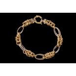 AN 18CT YELLOW AND WHITE GOLD FANCY LINK BRACELET