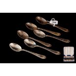 A MODERN SET OF SIX SILVER TEA AND COFFEE SPOONS, cased,