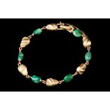 A STONE SET BRACELET, of naturalistic form,