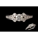 A CARTIER BALLERINA DIAMOND RING, mounted in platinum, with a box, GIA Cert, papers and bag,