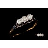 A THREE STONE DIAMOND RING,