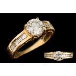 A DIAMOND SOLITAIRE RING, the brilliant cut diamond mounted in yellow gold,
