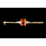 A CITRINE BAR BROOCH,