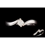 A DIAMOND SOLITAIRE RING, of twist design, mounted in 18ct gold. Estimated; weight of diamond; 0.