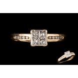 A DIAMOND FOUR STONE RING, mounted in 18ct gold. Estimated; weight of diamonds; 0.