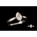 A SOLITAIRE DIAMOND RING, the marquise cut stone mounted in platinum, boxed with valuation.