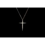 A DIAMOND CROSS AND CHAIN IN 9CT WHITE GOLD