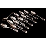 TWELVE GEORGIAN SILVER FIDDLE PATTERN DESSERT SPOONS of various dates and makers