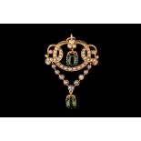 AN EDWARDIAN SEED PEARL AND TOURMALINE PENDANT