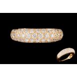 A DIAMOND PAVÉ RING BY CARTIER, of graduated bombé form, set with diamonds of approximately 1.