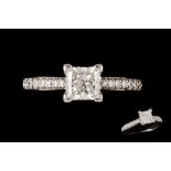 A DIAMOND CLUSTER RING, set with a princess cut diamond weighing 0.